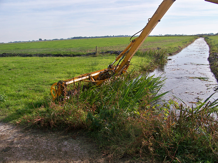 The arm cleans the ditch