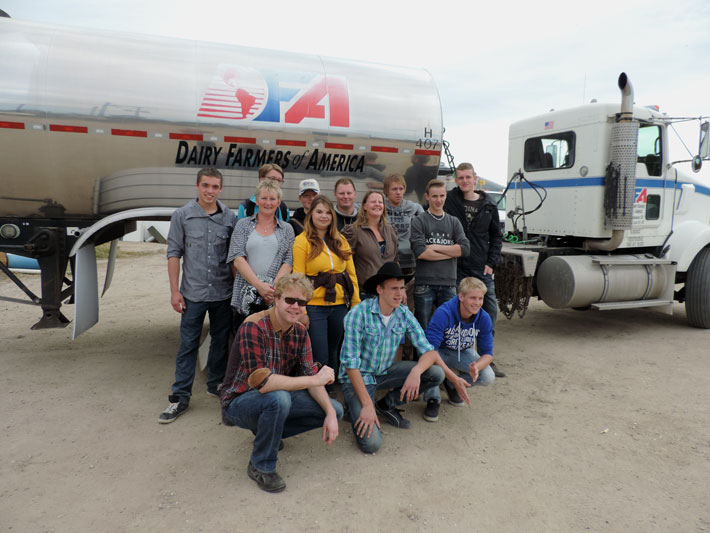 Group picture in front of the DFA milk truck. The milk is collected every day.