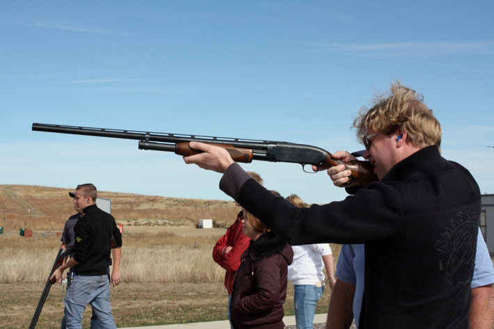 Gerko shooting a shotgun.
